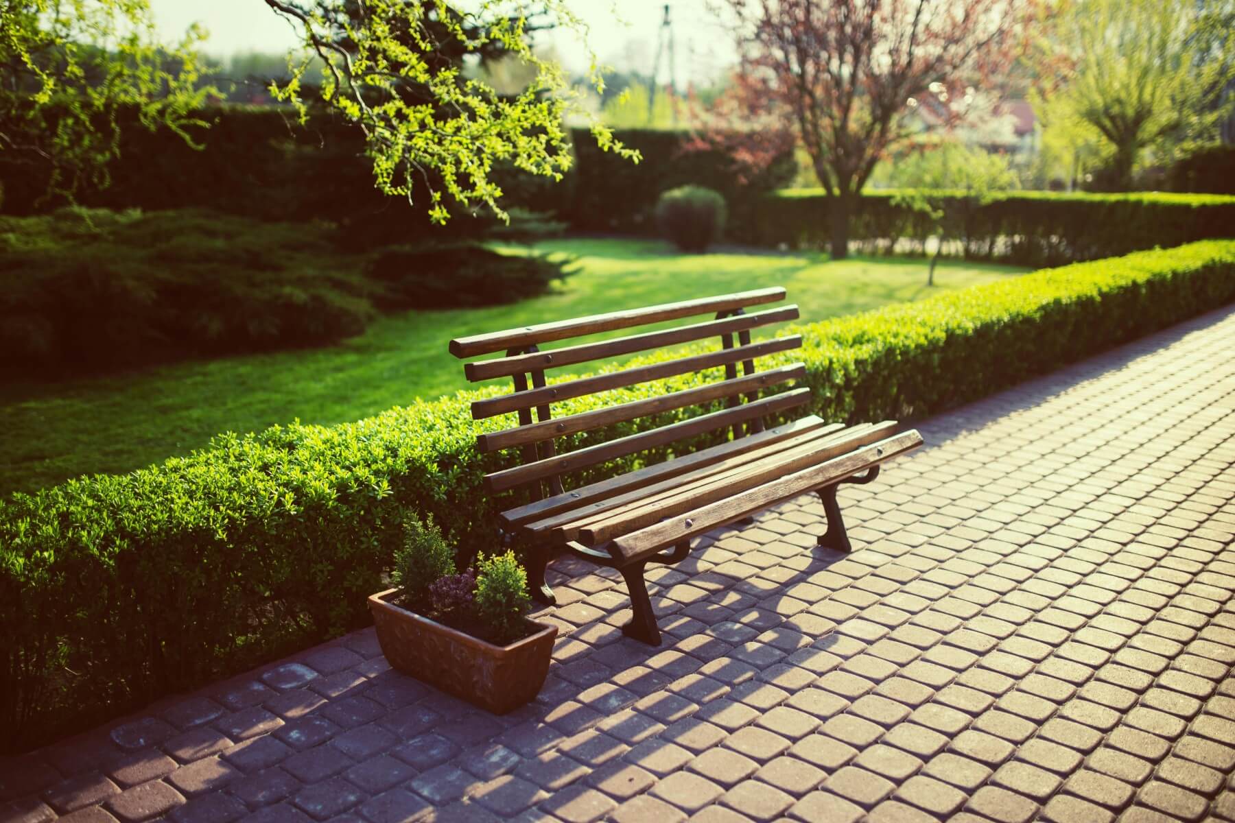 Hand-laid block paving with bench seating